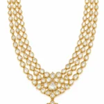 Ornate 22K gold Kundan bridal necklace with three layers of Polki and a central Polki pendant by SHA Jewelers
