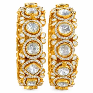 Traditional gold Polki bangles with floral stone settings by SHA Jewelers